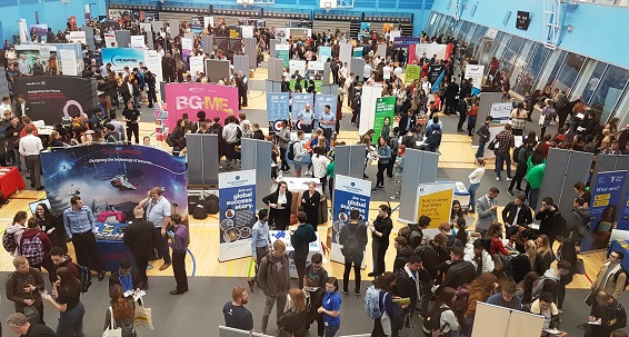 Campus recruiting in person at a university job fair